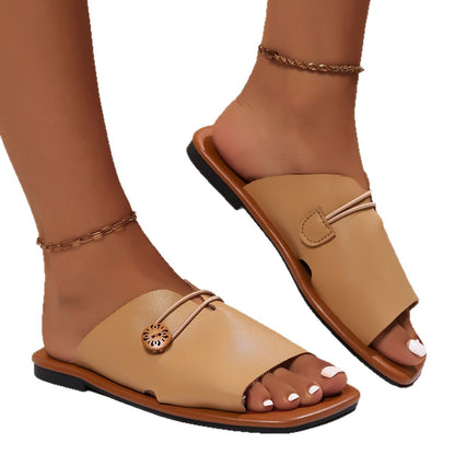 Elegant Open-Toe Slip-On Sandals with Decorative Button Detail