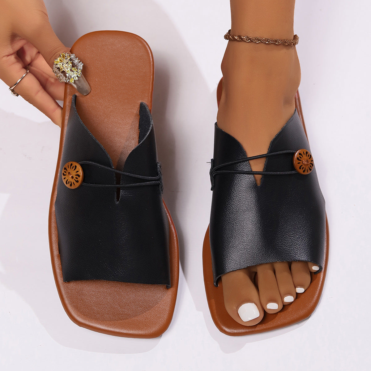 Elegant Open-Toe Slip-On Sandals with Decorative Button Detail